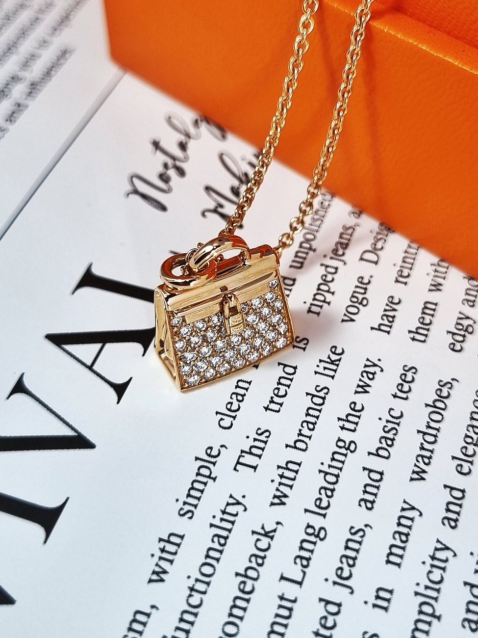 Украшение Hermès  Amulettes Kelly pendant  H121310B 00 