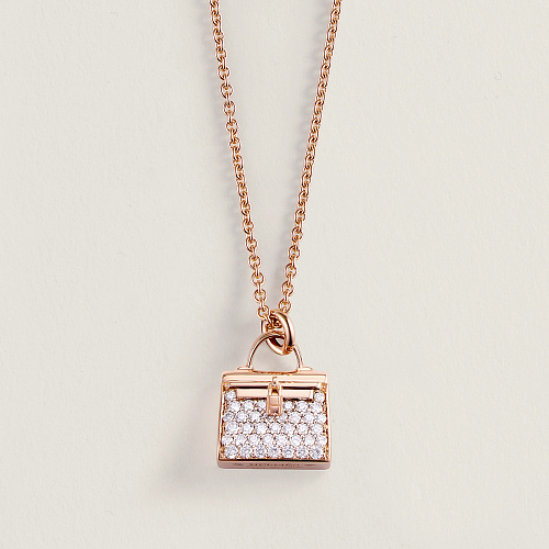Украшение Hermès  Amulettes Kelly pendant  H121310B 00 