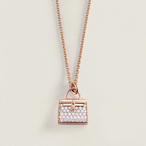 Украшение Hermès  Amulettes Kelly pendant  H121310B 00 